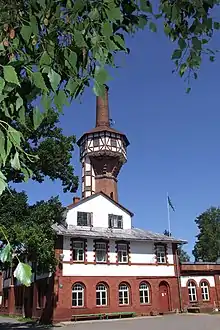 Strenči mental hospital with a water tower.