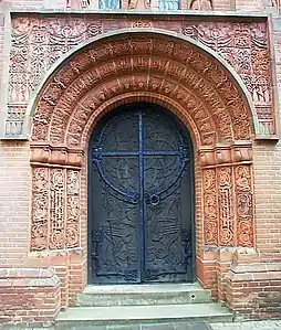 Portal of Watts Cemetery Chapel by Mary Fraser-Tytler in Compton, Surrey