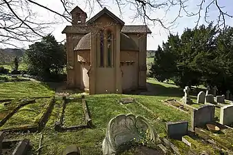 Chapel, showing in foreground terracotta grave marker made in the Compton pottery