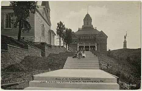 Presbyterian church, Schwab School and Civil War Memorial on an old postcard