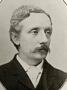Young man with drooping Victorian moustache