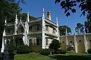 "Wedding Cake House" in Kennebunk, Maine, United States. Example of a house built in an older style modified in the Carpenter Gothic style in the mid 1800s.