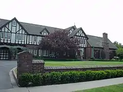 The Leonie Pray House, built for Signal Hill oilman William E. "Billy" Babb in 1927; Tudor Revival architecture by Clarence Aldrich. It appears in Not Another Teen Movie,  Weird Science, and Donnie Darko.