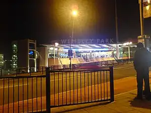 Wembley Park Station, viewed from across the street at night