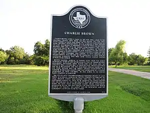 Charlie Brown state historic marker on Brazos Ave.