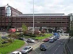 The "bridge to nowhere", a raised podium over the M8 that was developed into an office building in the 1990s