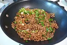Wheat berries cooking - soaked then sauteed with spring onion