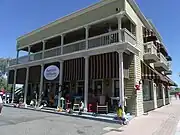 Texas Hotel built in 1895. At first located in the mining area, it was moved to this location circa 1904. Owned and operated by Everett and Myrtle Coxwell, the hotel had a restaurant on the street floor and eight rental units upstairs.