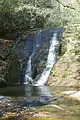 Widow Creek Falls in Stone Mountain State Park is a short spur walk off the trail.