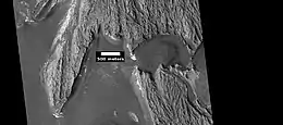 Light-toned deposit in Arsinoes Chaos, as seen by HiRISE under HiWish program.