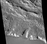 Channels just to south of Sinton, as seen by CTX camera. These were created when the impact occurred in ice-rich ground.  Note: this is an enlargement of the previous image of west side of Sinton.