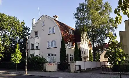 General view with the gable of the garage building on the right