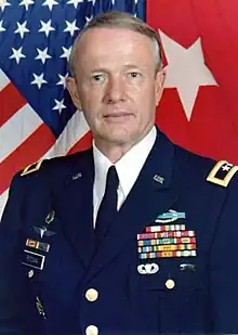 1991 color head and shoullders photo of Major General William A. Roosma in dress uniform, seated, facing front