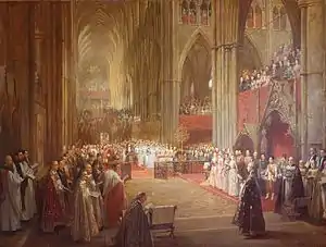 Many people in fine robes and dresses standing inside the abbey. In the middle distance, Queen Victoria sits on a chair raised on a platform.