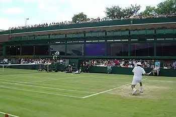 Image 32Sébastien Grosjean takes a shot on Court 18 during the 2004 Championships. (from Wimbledon Championships)