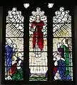 Window above the chancel arch in memory of Revd J Smaridge. By Horace Hincks and Pope & Parr 1946.