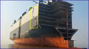 Window cut for ventilation and illumination of hull during ship recycling