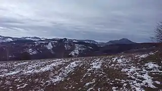 Landscape from top of Opaljenik in winter; Mountain Mučanj in the right corner