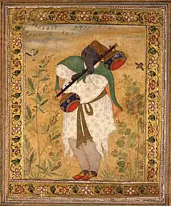 Ca. 1605. Portrait of Naubat Khan by Ustad Mansur, Mughal School ca. 1605, British Museum, London. The instrument is depicted with two strings.