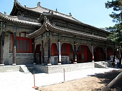 Xieshan roof with multiple eaves on the Mahavira Hall of Xiantong Temple on Mount Wutai, Wutai County, Shanxi, China