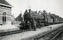 Locomotive from the series 4300 ("Austerities") of the N.S. with a train at the railway station in Waalwijk.