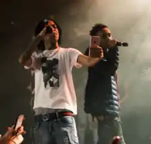 YBN Nahmir (left) and YBN Glizzy performing together in January 2018