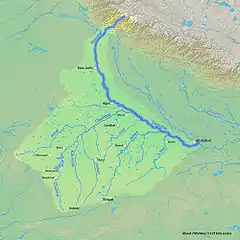 The Yamuna is the second-largest tributary river of the Ganges and the longest tributary in India. It flows almost parallel to the Ganges about its right bank for 1,376 kilometres (855 mi) before merging with it at the Triveni Sangam, Allahabad.