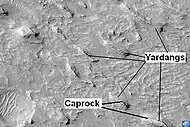 Yardangs with caprock labeled, in Aeolis (HiRISE)
