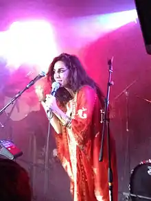 Hamdan performing in 2013