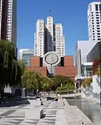 The building as seen from Yerba Buena Gardens, rising behind the San Francisco Museum of Modern Art