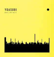 A solid black city with a yellow background, showing the group's name "Yoasobi" and their slogan "novel into music" on the left-top corner, and a solid black circle on the right-top corner