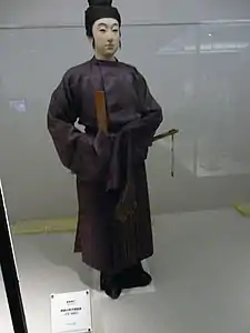 Men's dress, with kanmuri hat, hakama, ornate sash, shaku and sword