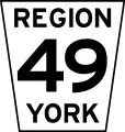 Typical Ontario county/regional road sign using an inverted isosceles trapezoid