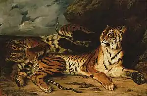 A Young Tiger Playing with Its Mother