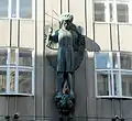 Ferdinand Andri: sculpture Archangel Michael on the facade