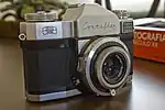Contaflex Prima, an SLR camera finished in chrome and black leather
