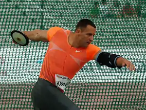 Image 26Zoltán Kővágó preparing to spin and throw the discus (from Track and field)