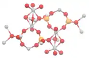 In VO(HPO4)·0.5H2O, pairs of vanadium(IV) centers are bridged by water ligands.