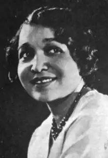 A portrait of a smiling African-American woman, from a 1942 publication.