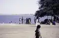 Women with food for sale in dishes on their heads, Niger River bank, Segou 1972