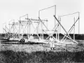 Karl Jansky and his rotating directional radio antenna (1932) in Holmdel, New Jersey, which was the world's first radio telescope, discovering radio emissions from the Milky Way.