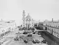 The plaza in 1900, by Abel Briquet. The palace is at the background.