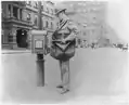 Street types of New York City-Postman at letter box