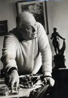 Black and white photograph of Jean Renoir in his mid 60s