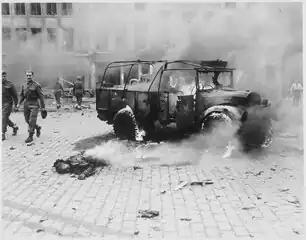 Aftermath of a V-2 rocket attack on the main intersection in Antwerp, Belgium, 27 November 1944