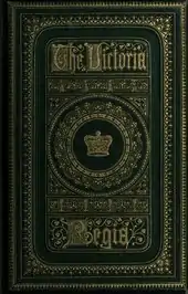  Book cover showing a large, deep blue volume. The words "Victoria Regia" are prominent in the center, in a large, heavy, old-fashioned font, with gold embossed lettering. The title is surrounded by gold-embossed scrolls.