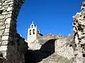 Vista de la iglesia de Santa María en Moya (Cuenca), desde la Bajada a la Puerta de los Ojos.