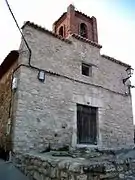 Vista de la fachada de la iglesia de Negrón, Vallanca (Valencia), tras su restauración.