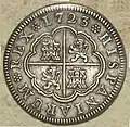 Anverso de moneda de 2 reales (plata) de Felipe V con «ceca» de Segovia del año 1723.