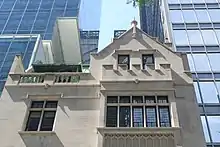 Upper stories and roof of the house